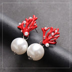 Kolczyki wiszące z czerwonym koralem i perłami