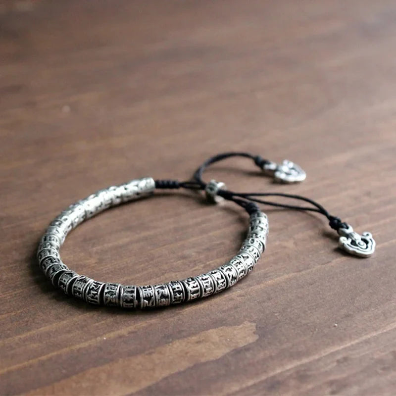 Bransoletka z grawerowaną amuletem buddyjskim