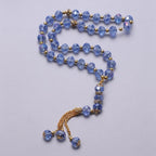 Elegancki muzułmański różaniec - islamski tasbih 33 niebieskie i złote koraliki