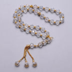 Elegancki muzułmański różaniec - islamski tasbih 33 kryształowe i złote koraliki