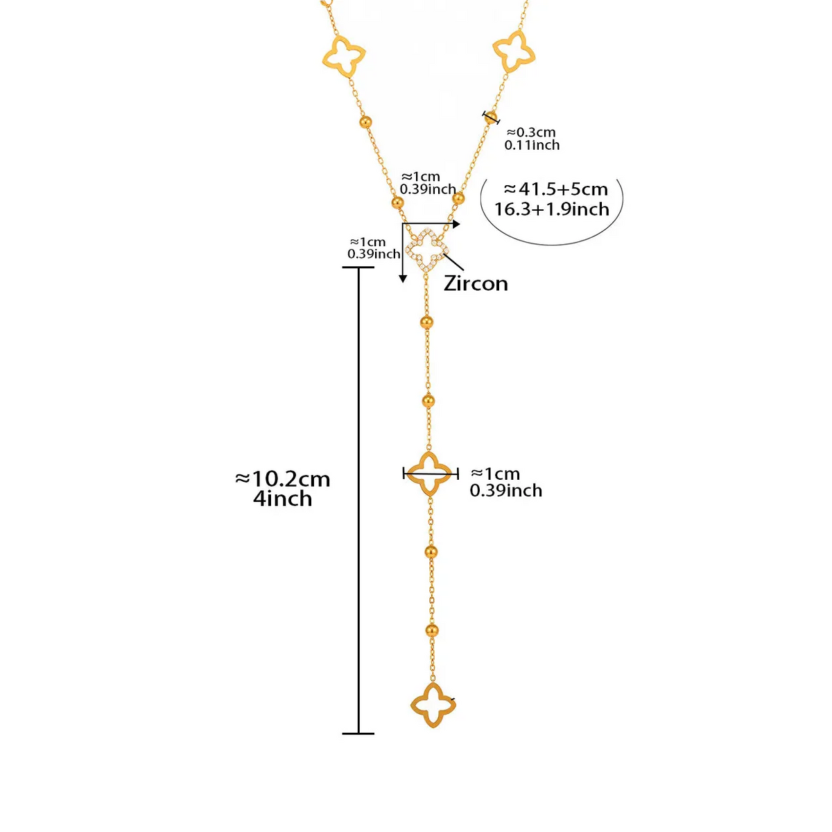 Długi naszyjnik z zawieszkami w kształcie czterolistnej koniczyny i cyrkonią